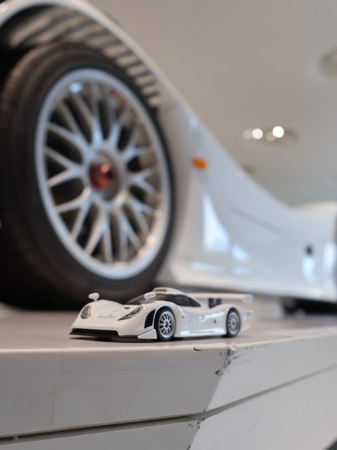 A Le Mans racer with license plates. The Porsche 911 GT1 Straßenversion, photographed in the workshop of the Porsche Museum in Stuttgart. Only a couple of dozen were ever built. The full series is live on miniflatsix.com.