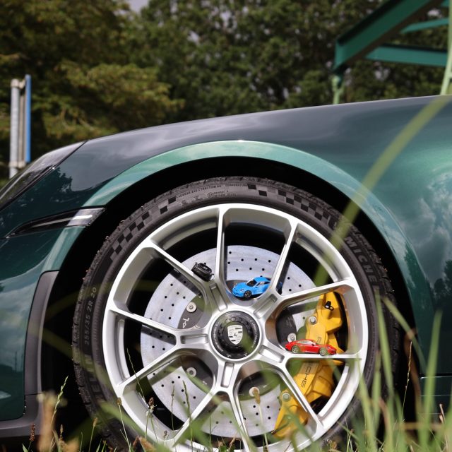Nine Thousand, Quietly. A 992 GT3 Touring on the roads around my hometown, with three 1:43 models by @minichampsofficial . Even when it rains, we keep shooting. Wet tarmac, drops on the paint and an owner who gave me all the time in the world. The full series is live on miniflatsix.com.
